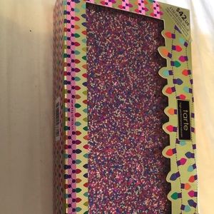 Clutch with highlighter palette.